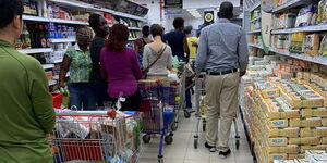 Customers queueing at a supermarket in Kenya