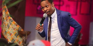 Comedian Sleepy David performing at the Churchill show stage.