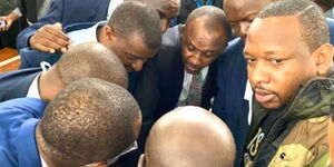 Politician Mike Sonko flanked by his lawyers after his arrest in 2019