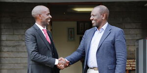 Nominated Member of Parliament (MP) Wilson Sossion shakes hands with Deputy President William Ruto on Monday, October 11.