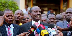 File image of KNUT Secretary-General Wilson Sossion (centre)