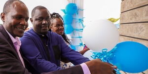 Gordon Paul Ogada (centre) at the official opening of his new home in Migori County 