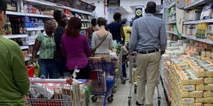 Shoppers lining to buy goods at a supermarket in Nairobi, Kenya