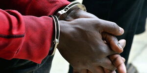 Suspect in cuffs following arrest