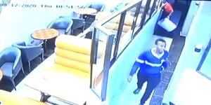 CCTV footage captures two suspects believed to have murdered a guard and an IT expert
