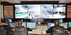 Police Officers monitoring screens at a surveillance center in Nairobi. 