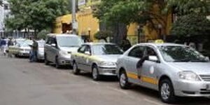 Taxis pictured while parking in a street in Nairobi