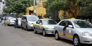 Taxi vehicles pictured while parking along Nairobi's Central Business District on July 9, 2021. 