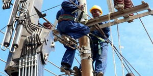 File image of Kenya Power technicians making repairs 