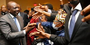 President William Ruto interacting with Kenyans in the US on December 2022