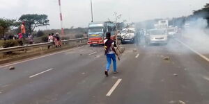 A woman protesting on Thika Road, September 5.