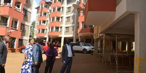 Kiambu County officials inspecting a building in Thindigua after evacuating residents on April 7, 2023