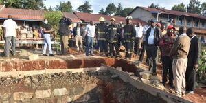 Residents at a scene where a toilet collapsed in Githunguri, Kiambu County on Friday, June 3, 2022