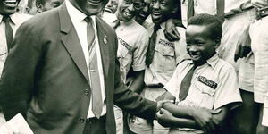 om Mboya with students of his alma mater, Mang'u High School in November 1963.