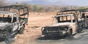 An image of the torched police vehicles along the Lodwar-Kitale highway.