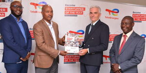 TotalEnergies Marketing Kenya PLC Managing Director, Eric Fanchini (second right) with Strategy & Corporate Affairs Director Adele Tura (second left), Corporate Affairs Manager Jackson Ongubo (right) and  Digital Coordinator Robert Kigweru (left) during the launch of the 4th edition of the "Startupper of the Year Challenge by TotalEnergies". 