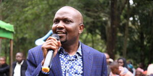 Trade CS Moses Kuria in Murang'a County during a food distribution exercise on June 24, 2023