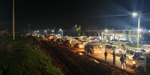 Motorists stuck along the Kisumu-Kapsabet highway following an accident on Saturday, October 18, 2025.