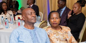 Mbooni MP Kivasu Nzioka (left) attending an event with his wife Juliana Kivasu.