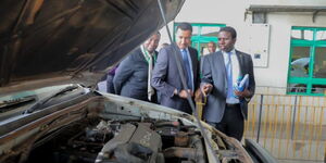 Transport PS Mohamed Daghar and an NTSA official inspect a vehicle at the  inspection centre along Likoni Road on April 17, 2023.