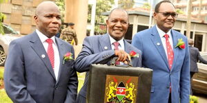 From left: Economic Planning PS James Muhati, Treasury CS Njuguna Ndung'u and Treasury PS Chris Kiptoo at Parliament Buildings on June 15, 2023