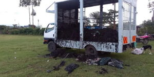 A truck containing garbage at Nakuru South Cemetery stopped by residents