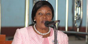 An image of Agnes Kavindu Muthama addressing the public at a past event