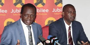 Former Jubilee Party secretary general Raphael Tuju with ex-chairman Nelson Dzuya at a past press conference. 