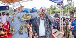 Ex-UDA vice chairman Kipruto Arap Kirwa and Azimio leader Raila Odinga at Mayuba Stadium, Sirisia constituency, Bungoma County on May 29, 2022
