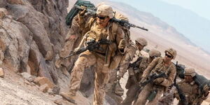U.S. Marines with 3rd Battalion, 23rd Marine Regiment, 4th Marine Division, Marine Forces Reserve, advance towards their support by fire position at Range 400, July 23, 2022.