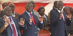 From left; Senator Samson Cherargei, Governor Stephen Sang and President William Ruto during a church service.