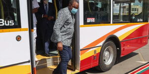 President Uhuru Kenyatta alighting from a Nairobi Commuter Bus in November 2020.