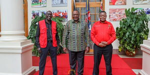 From left; Jubilee party Kiambaa MP candidate Kariri Njama, President Uhuru Kenyatta and Muguga ward MCA aspirant Githinji Mungara
