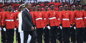 President Kenyatta inspects a guard of honour on arrival at Kinoru stadium in Meru on June 1, 2018.