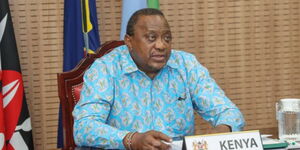 President Uhuru Kenyatta speaking on Thursday, April 8,  at State House, Nairobi when he delivered the opening statement during a virtual town hall meeting of the OACPS.