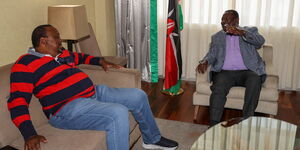 Former President Uhuru Kenyatta and Prime Cabinet Secretary Musalia Mudavadi meeting in Nigeria on May 30, 2023.  