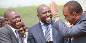 From left; President William Ruto, Trade CS Kipchumba Murkomen and former President Uhuru Kenyatta.