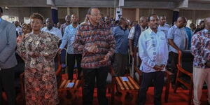 Former President Uhuru Kenyatta (centre) joins Wiper Leader Kalonzo Musyoka and Machakos Governor Wavinya Ndeti for the fundraiser of Full Gospel Church, Mwingi on November 19, 2023.