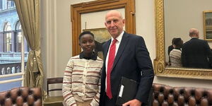 UK Defence Secretary John Healey with Esther Njoki