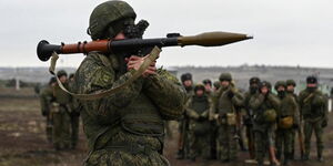 A Russian soldier preparing to fire a Rocket-Propelled Grenade launcher during the Russia-Ukraine war in Ukraine. 
