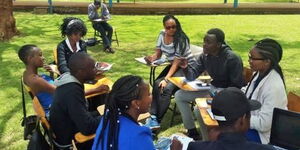 A group of college students holding a discussion.