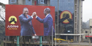 A billboard of President Uhuru Kenyatta and his deputy William Ruto at the Jubilee Party Headquarters in Pangani.