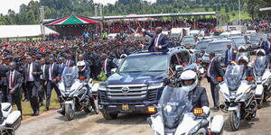 President William Ruto waving at Kericho residents as he after the Mashujaa celebrations on October 20, 2023.