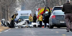 Ingham County sheriffs clear the scene of a fatal accident in Michigan on December 7,2014. 