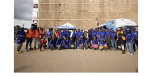 Vilcom Networks staff pose after company opened new office at the Maiyan Mall in Ongata Rongai.