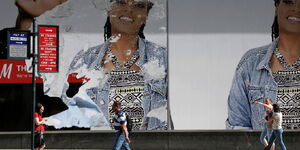 An edited image shared online showing Twitter user Waguthi on a billboard on Tuesday, February 18