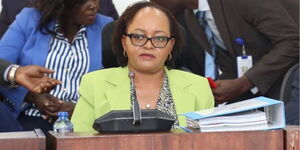 Kirinyaga Governor Anne Waiguru (right) with husband and lawyer Kamotho Waiganjo (left) in Senate in June 2020