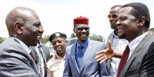 Deputy President William Ruto greets Sirisia MP John Waluike at an event in Bungoma County in 2018