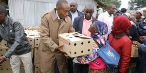 Kiambu Governor Kimani Wamatangi launches the distribution of chicks in July 2023