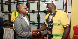 Former Presidential aspirant Jimi Wanjigi (left) greets President William Ruto.